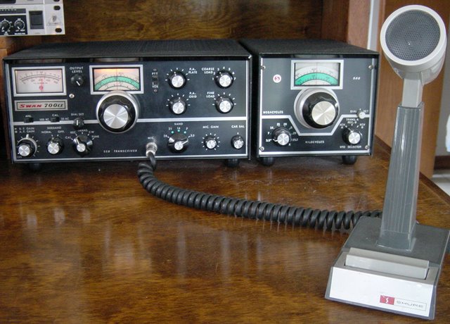 Close-up photo of his Swan 700cx with matching external VFO and Shure Microphone