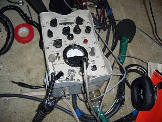 This looks like some sort of military test set connected to the Collins 618T transceiver